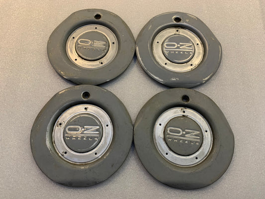 Oz Racing  M552B Genuine Caps set of 4 used condition, Cygnus 16” wheels