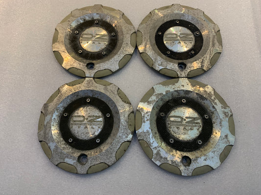 Oz Racing  M506 Genuine Caps set of 4 used condition.