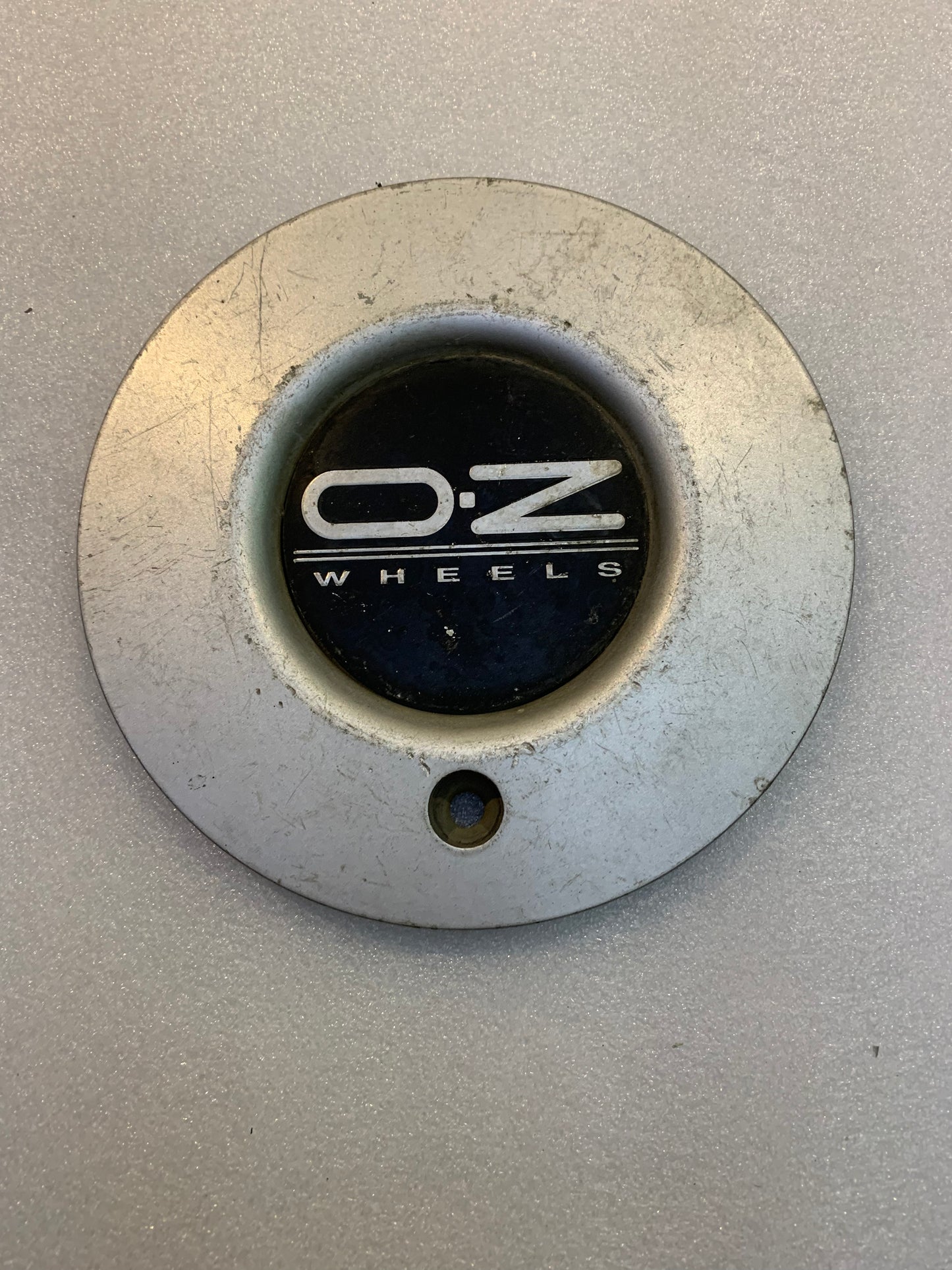 Oz Racing  M516 Genuine single Cap used condition.